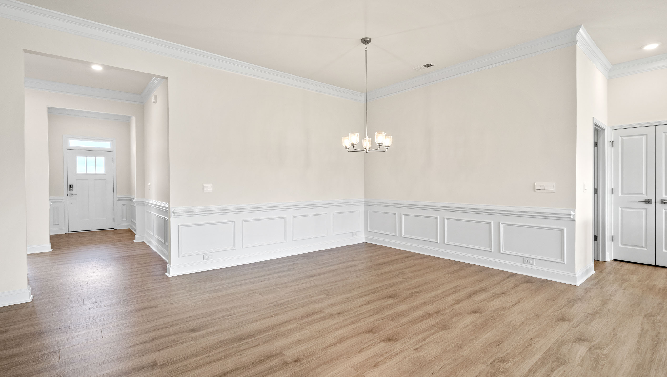 Dining room with chandelier.