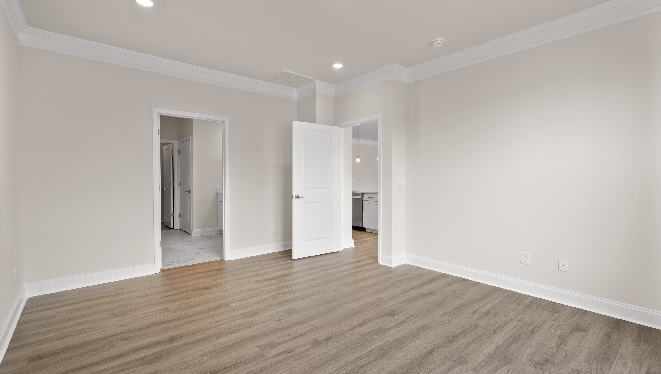Bedroom with carpet and window.