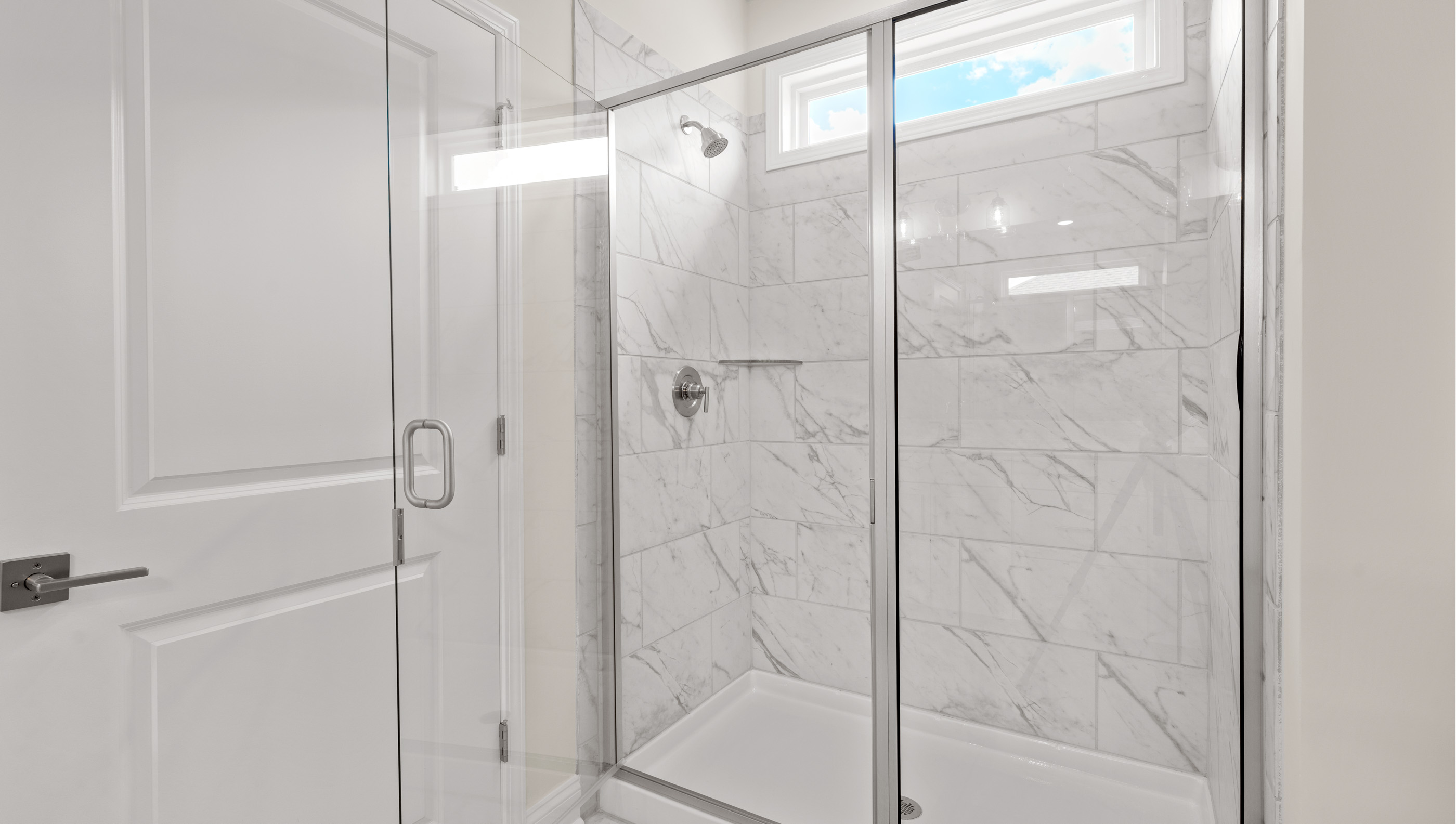 Bathroom with walk in shower.