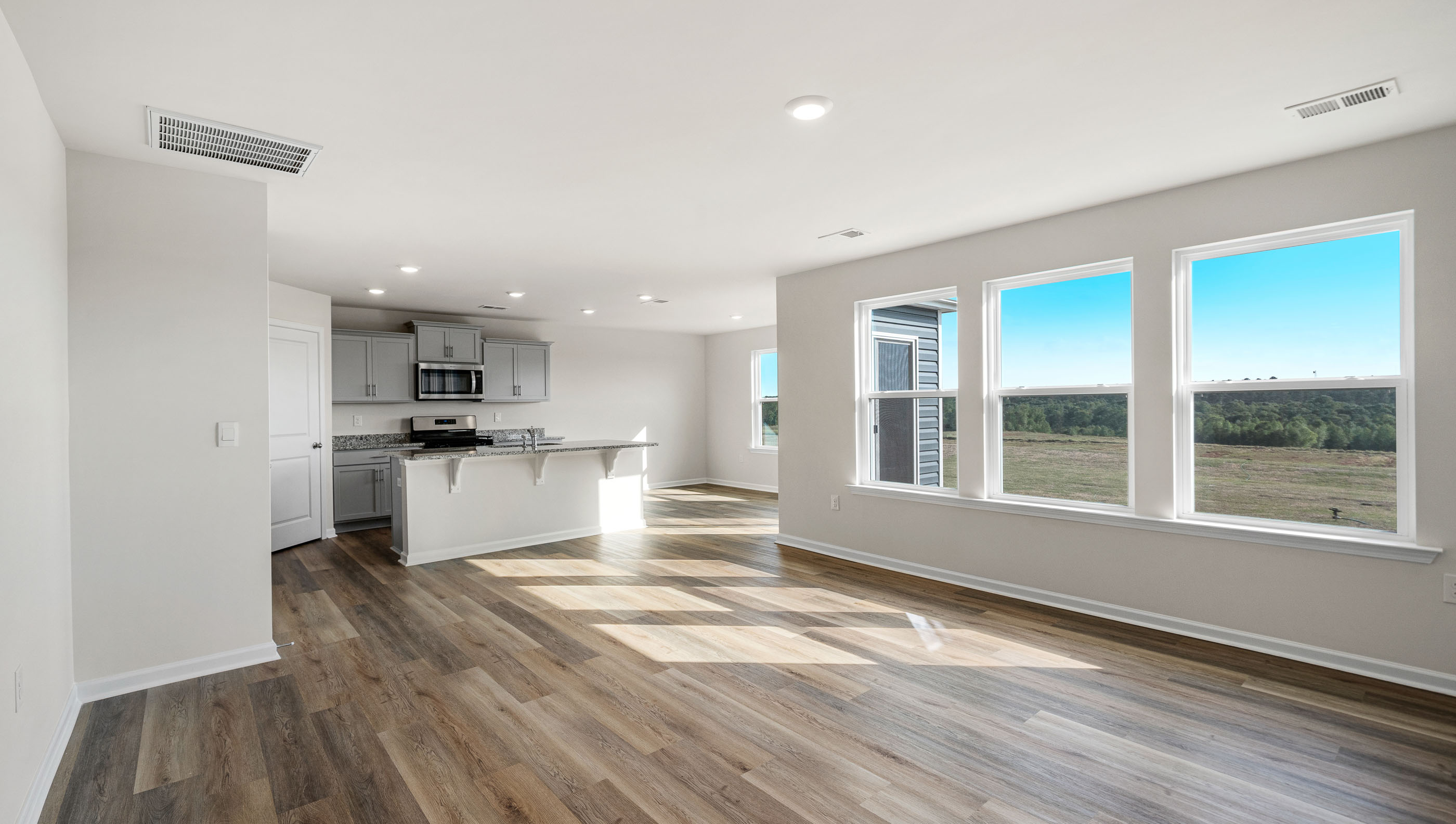 Family room with windows.