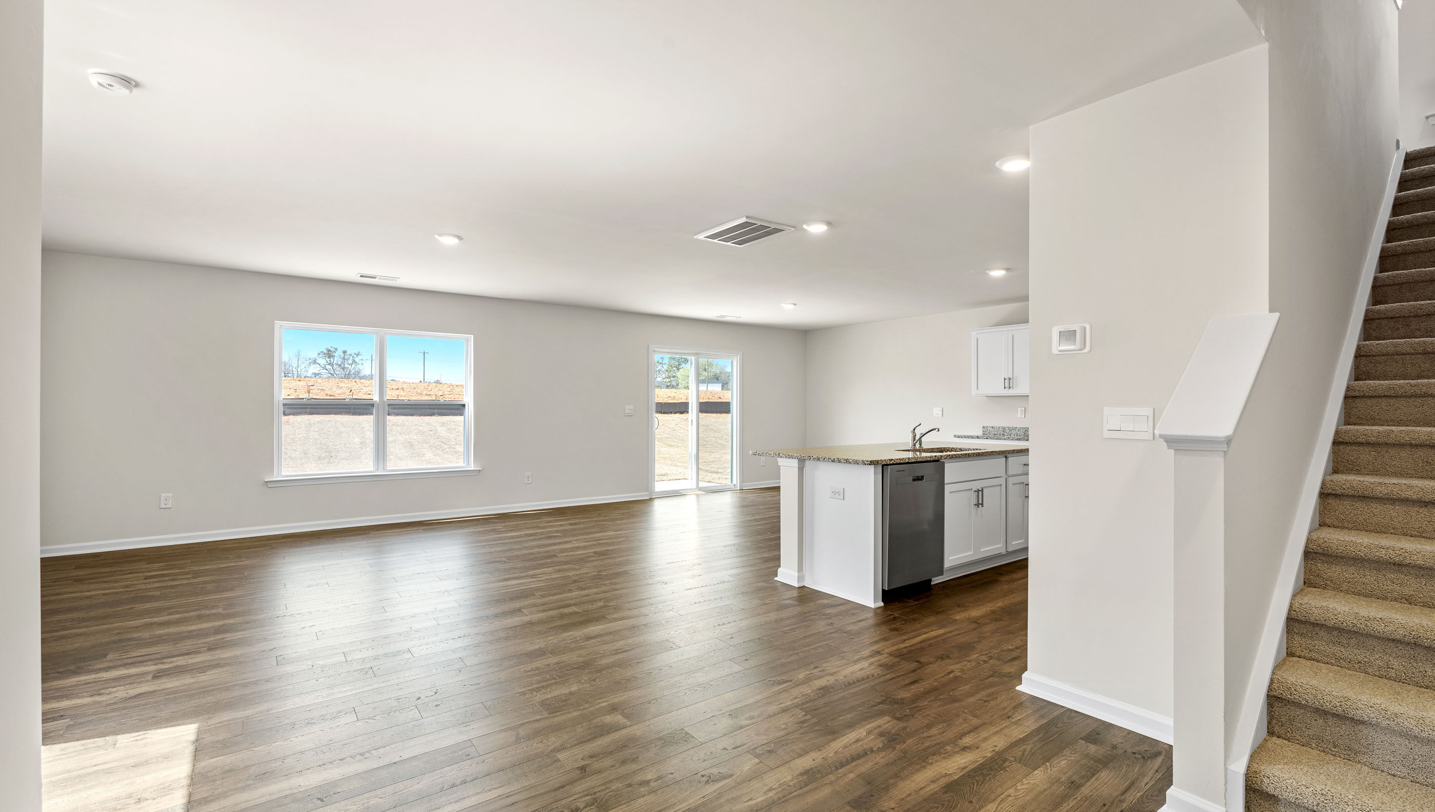 Family room with windows.