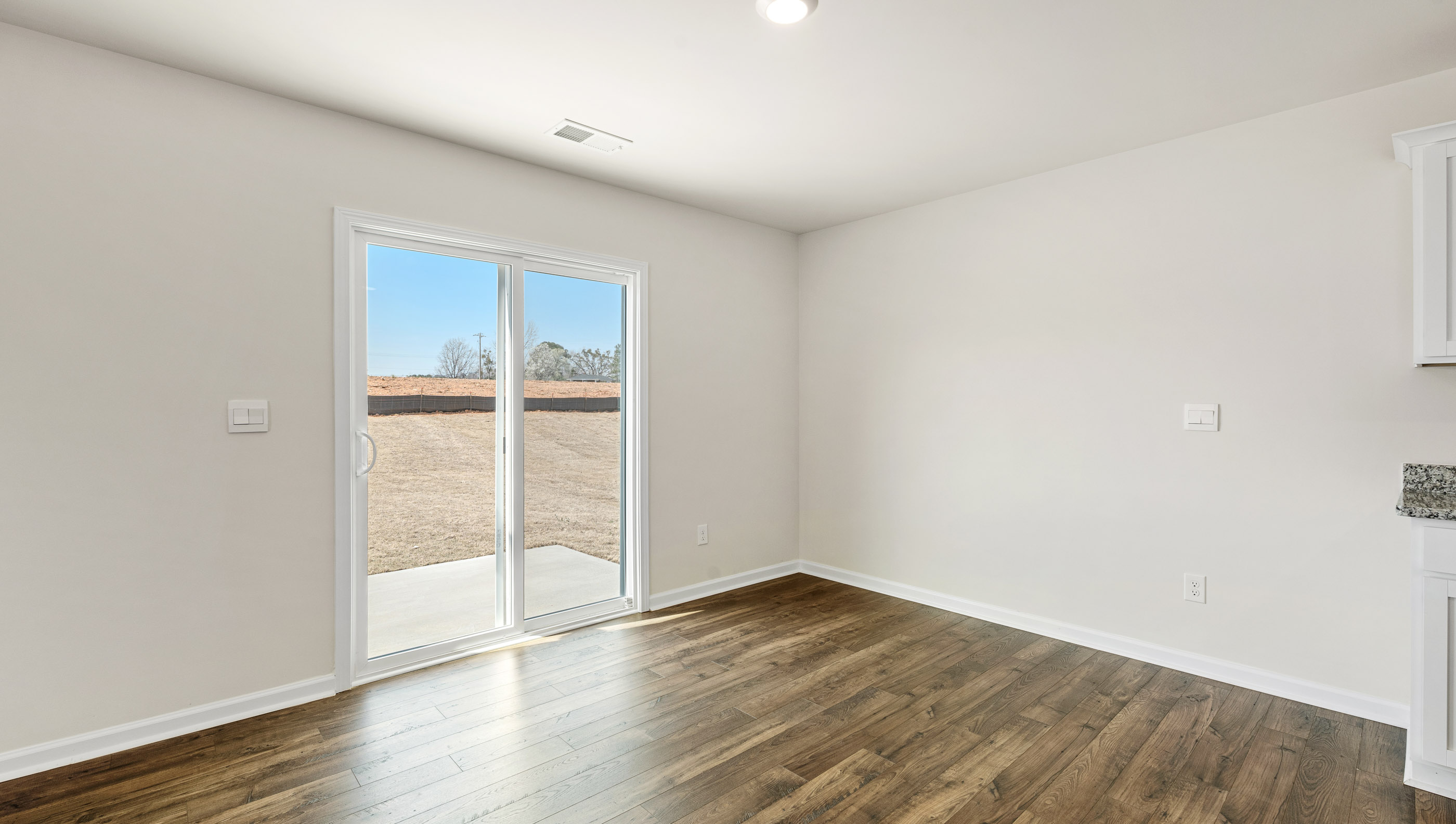 Family room with windows.