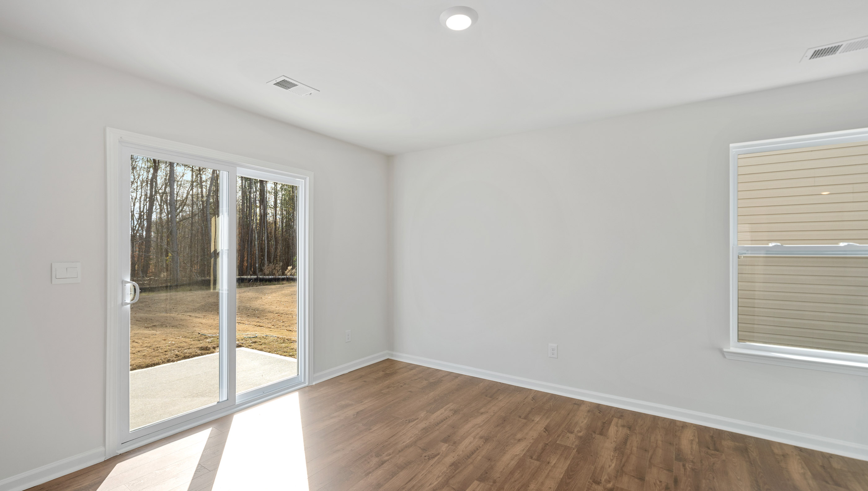 Family room with windows.