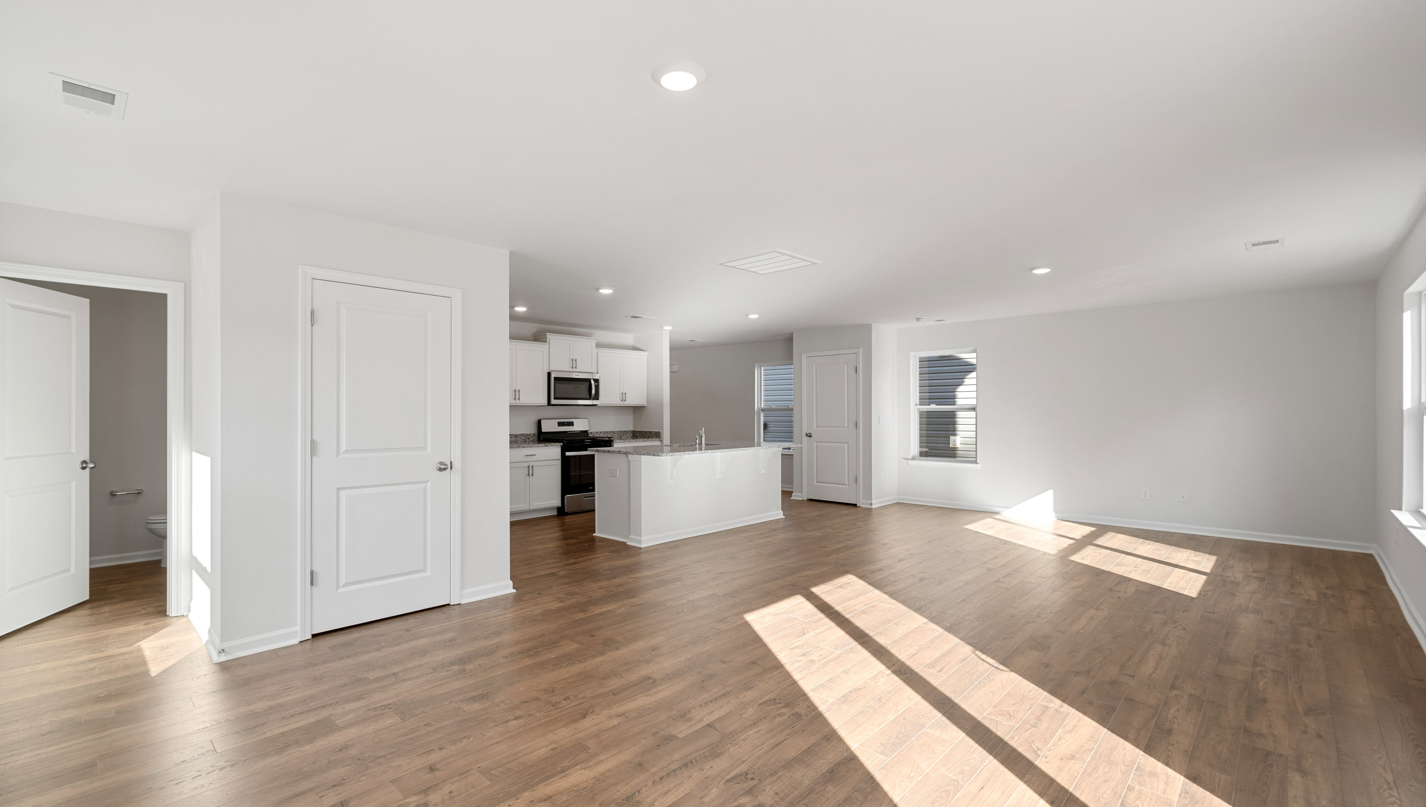 Family room with windows.