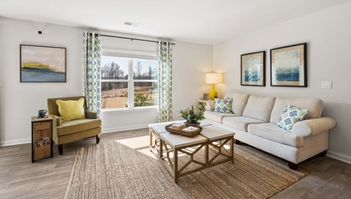 Family room with windows.