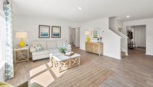 Family room with windows.