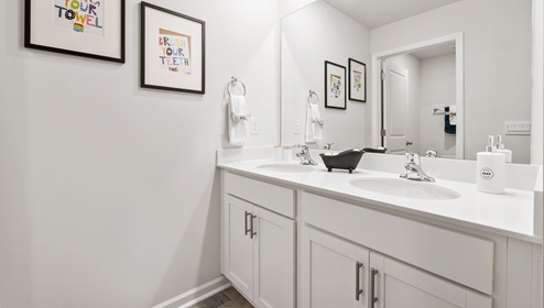 Bathroom with double vanity sink.