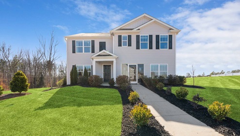 Front exterior of home with 2 car garage