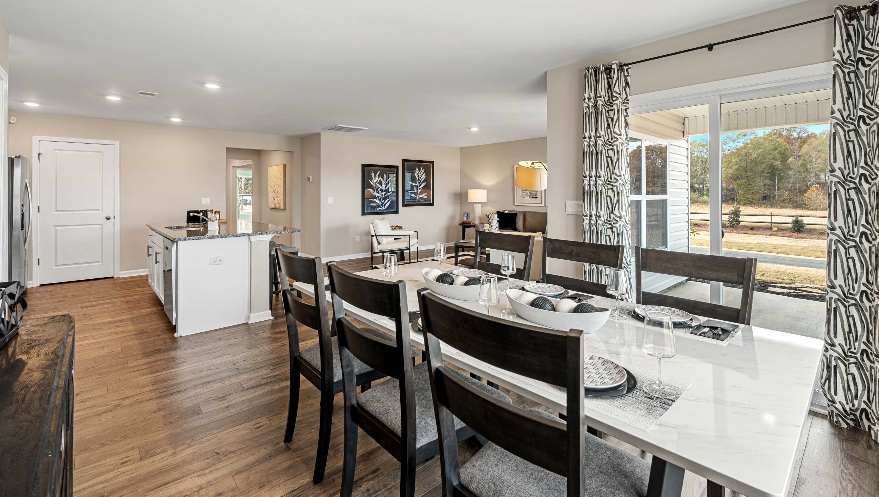 Kitchen and island with granite counter tops.