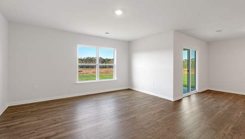 Family room with windows.