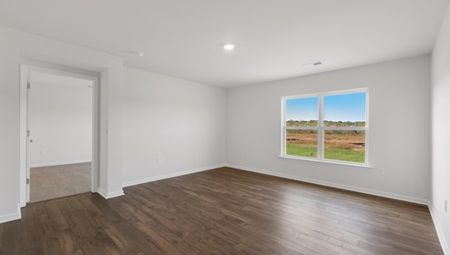 Family room with windows.