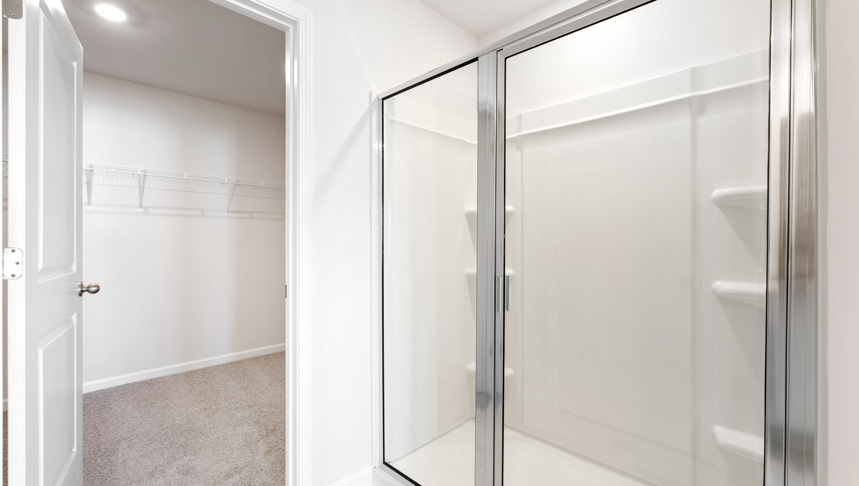 Bathroom with shower and clsoet.