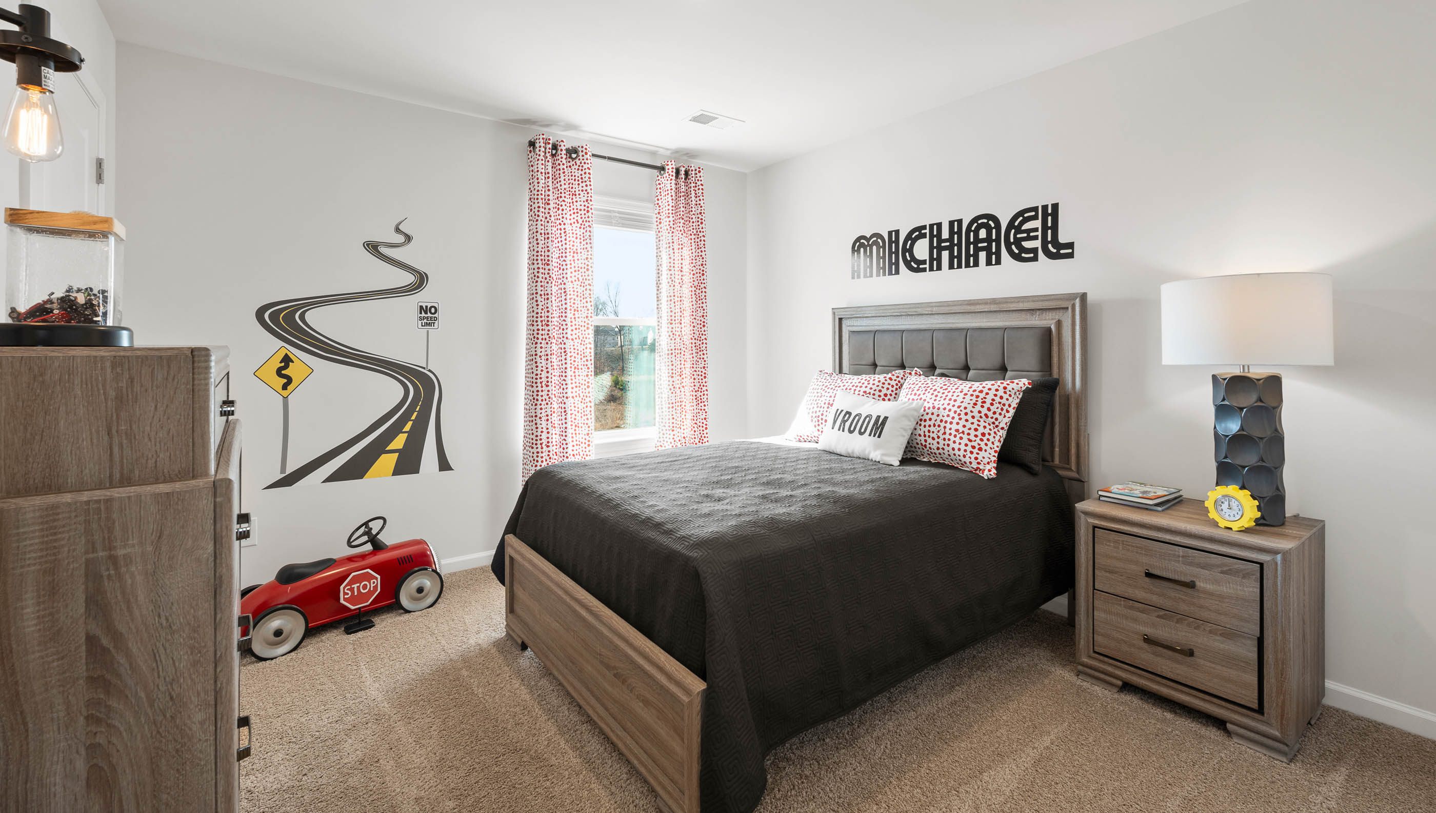 Bedroom with carpet and window.