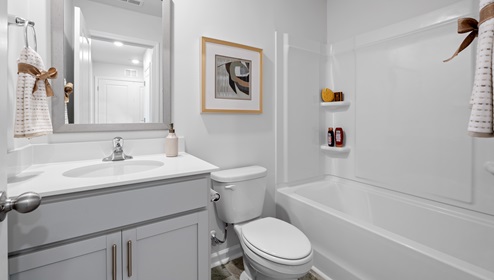 Bathroom with shower and sink.