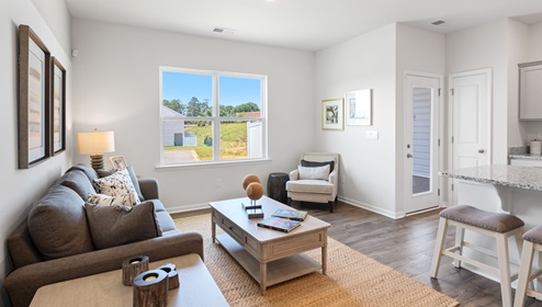 Family room with windows.