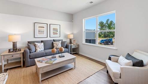 Family room with windows.