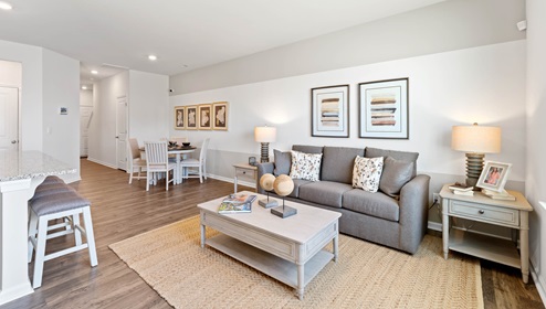 Family room with windows.