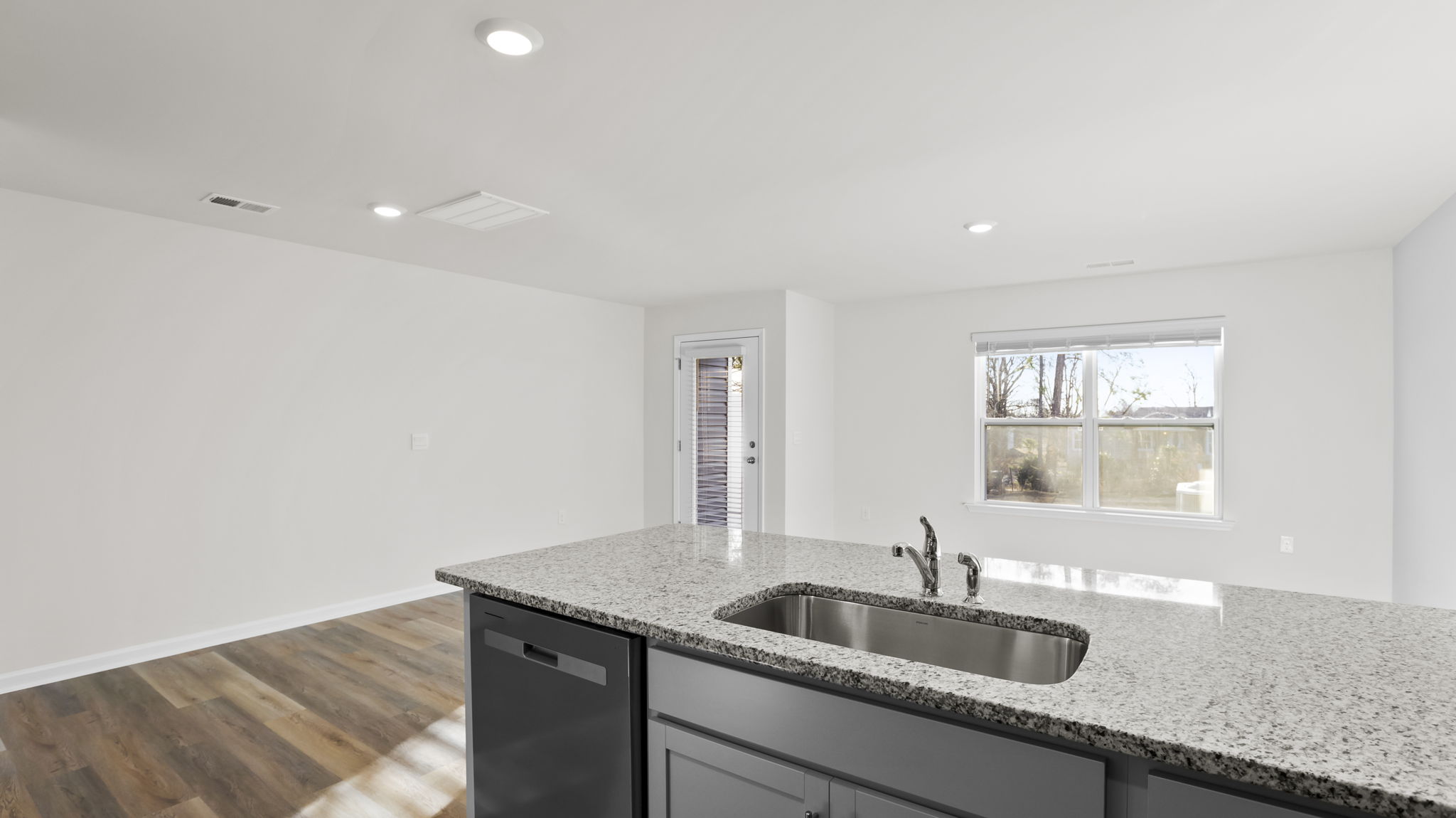 View from kitchen, large window.