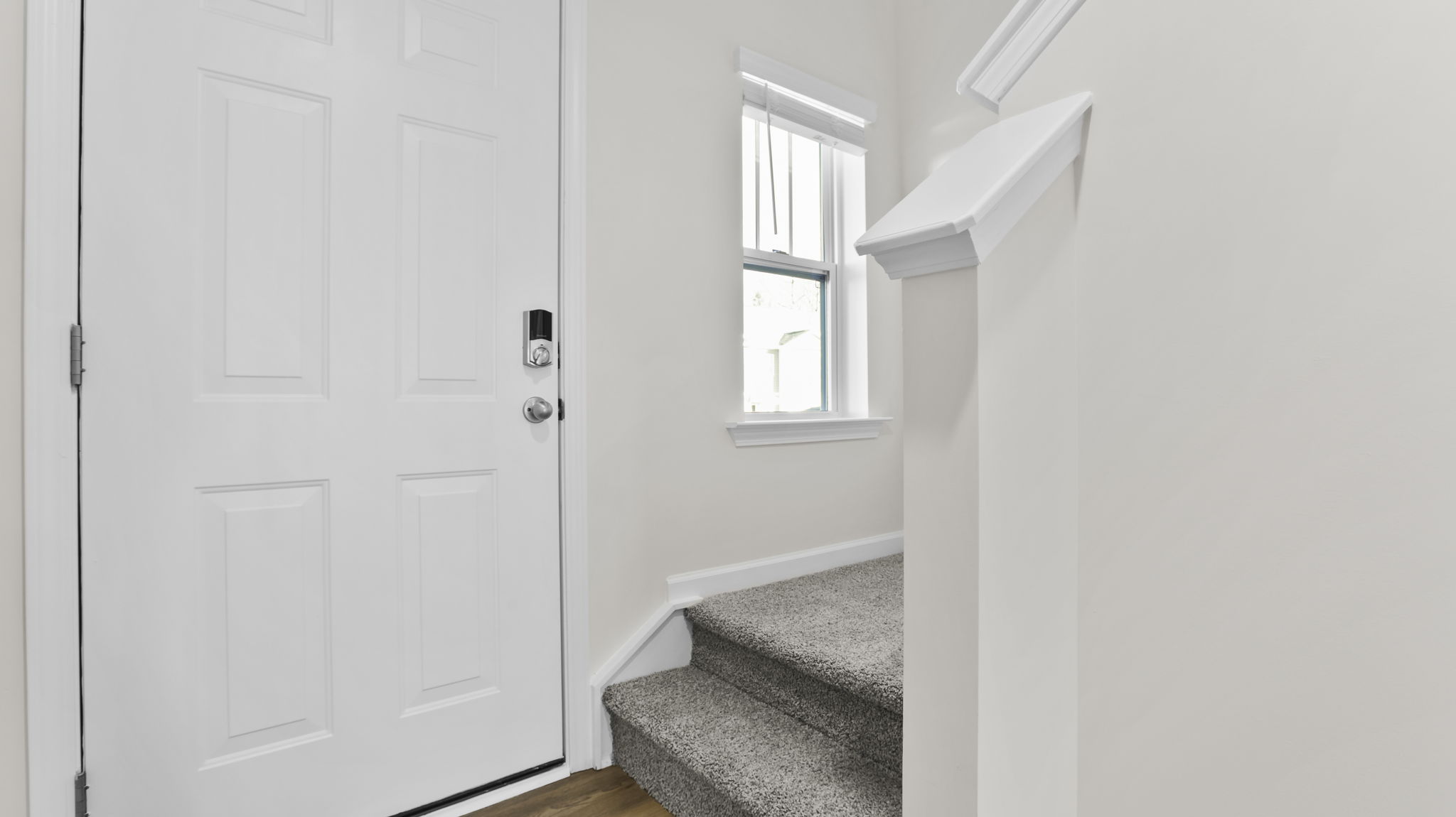 Foyer and stairwell to the upper level.