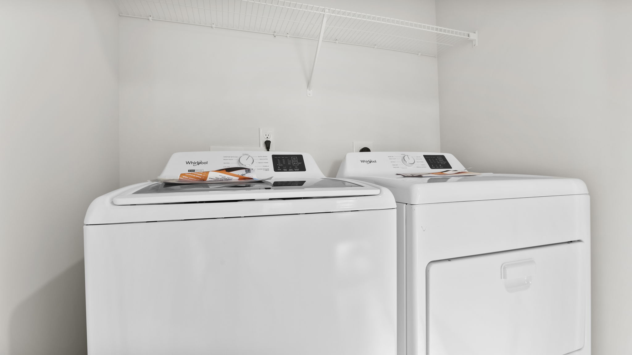 Walk-in laundry room.