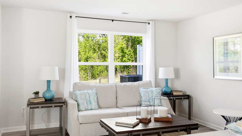 Family room with windows.