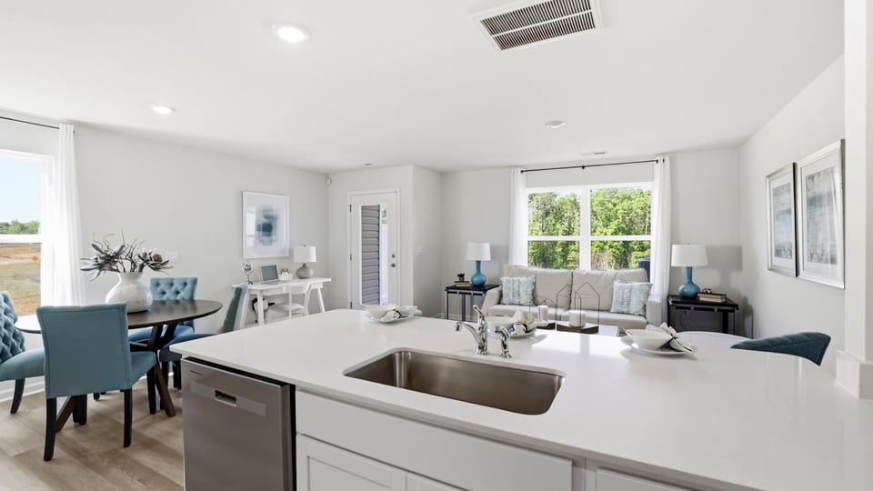 Kitchen with quartz countertops and stainless steel appliances