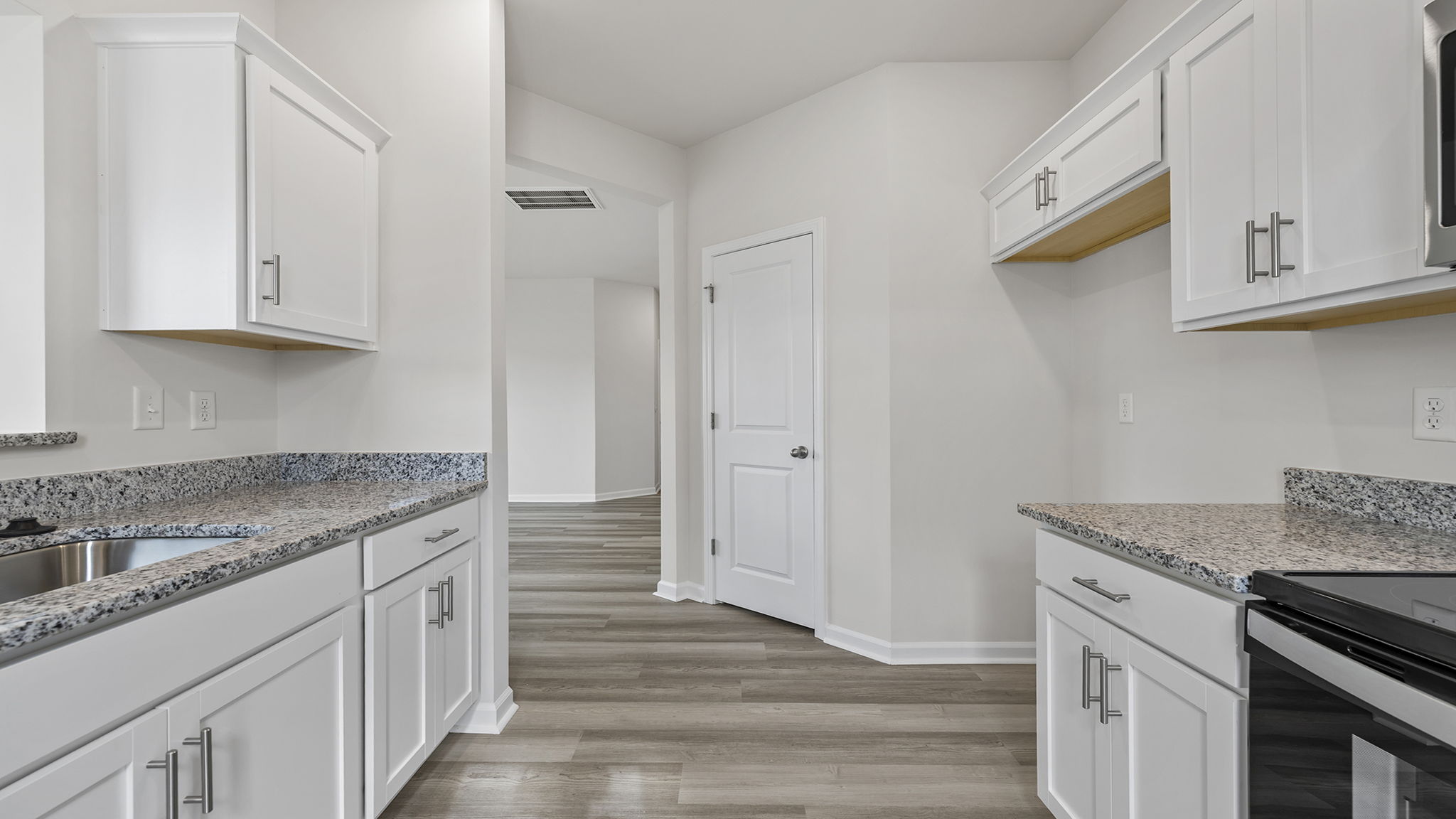 View from kitchen toward hallway.
