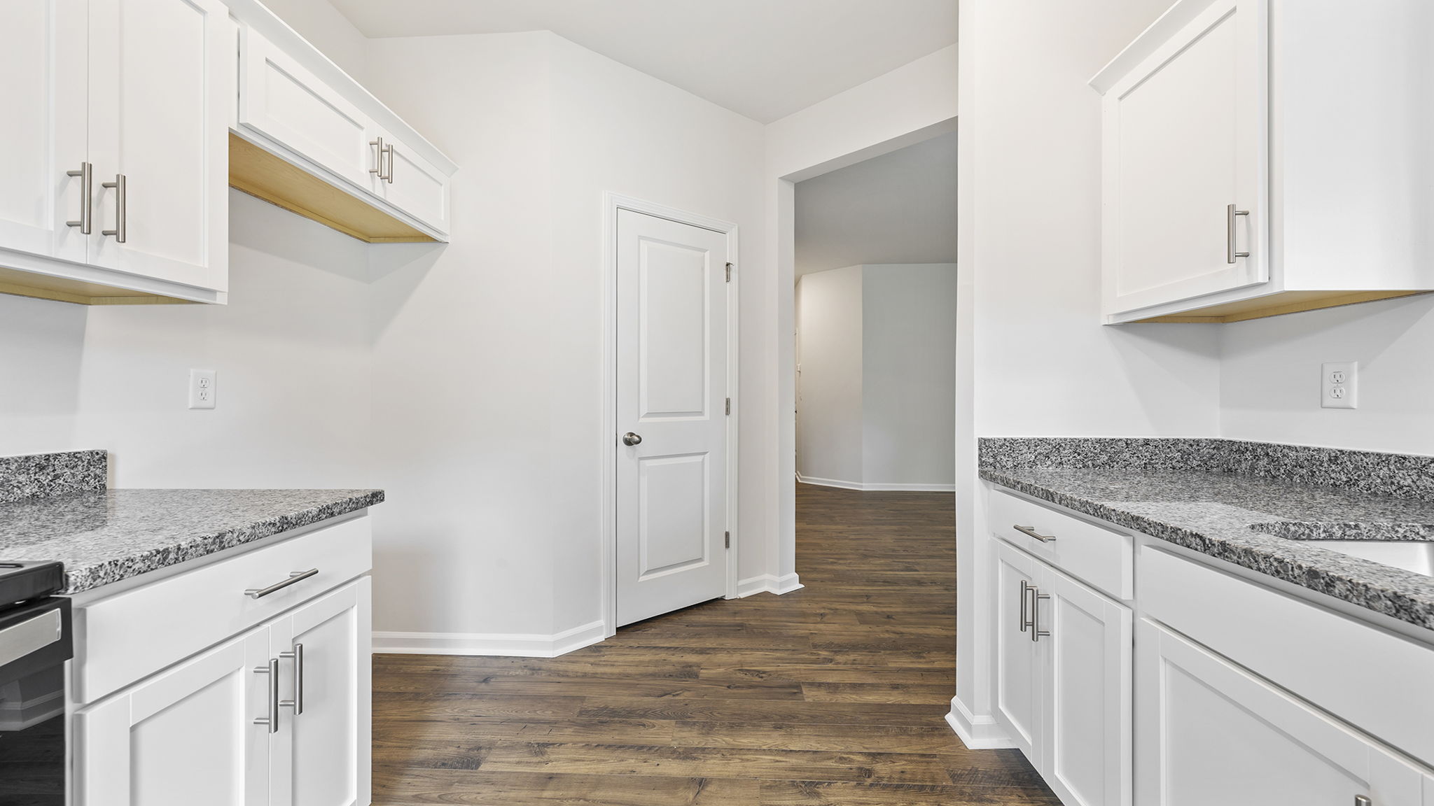 View from kitchen toward hallway.