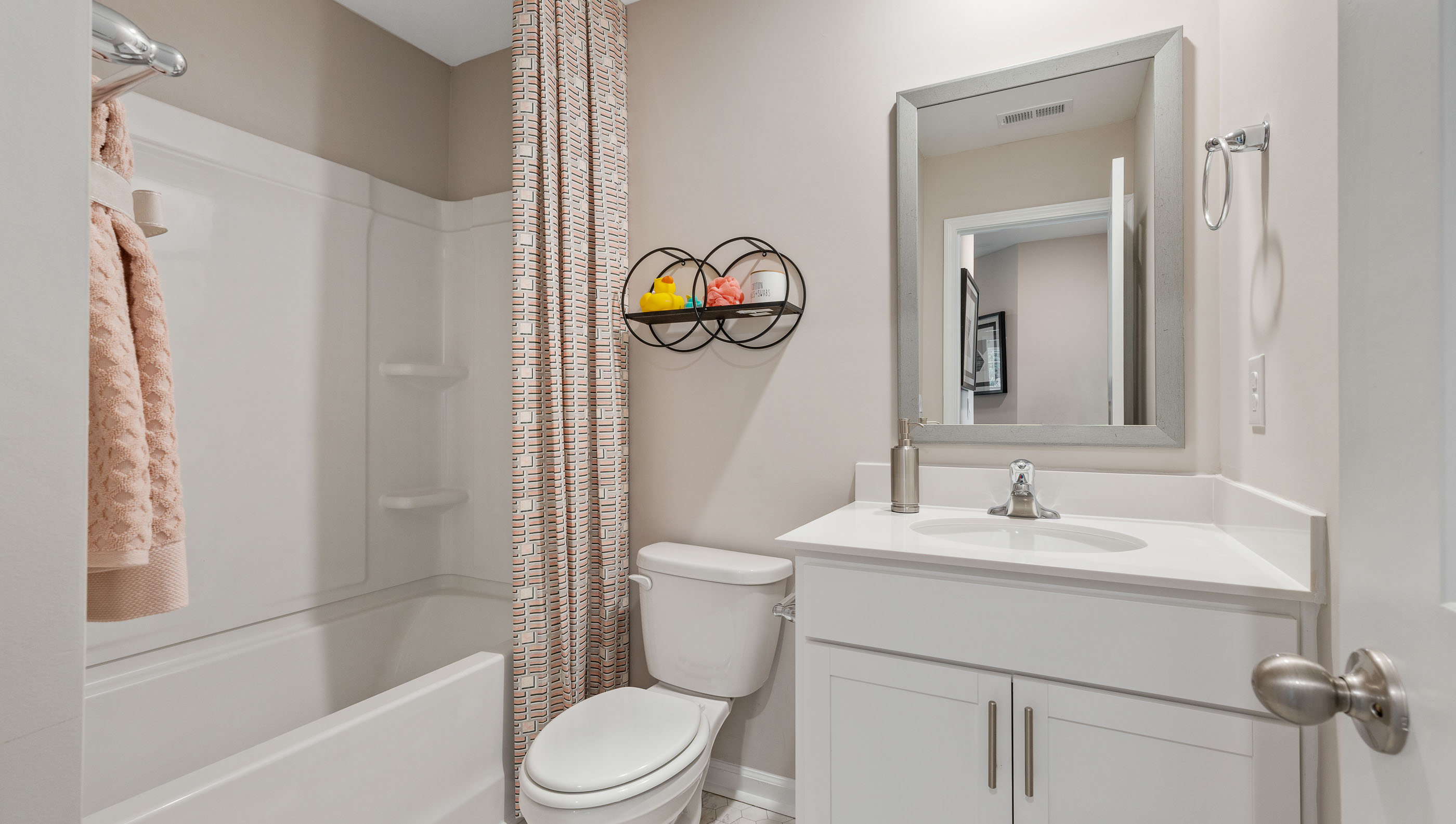 Bathroom with vanity sink.