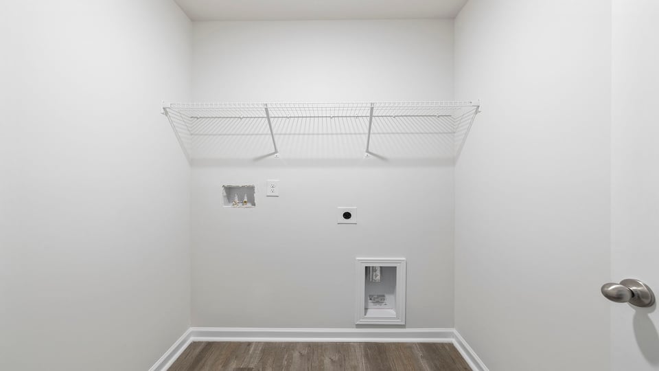 Walk-in laundry room.