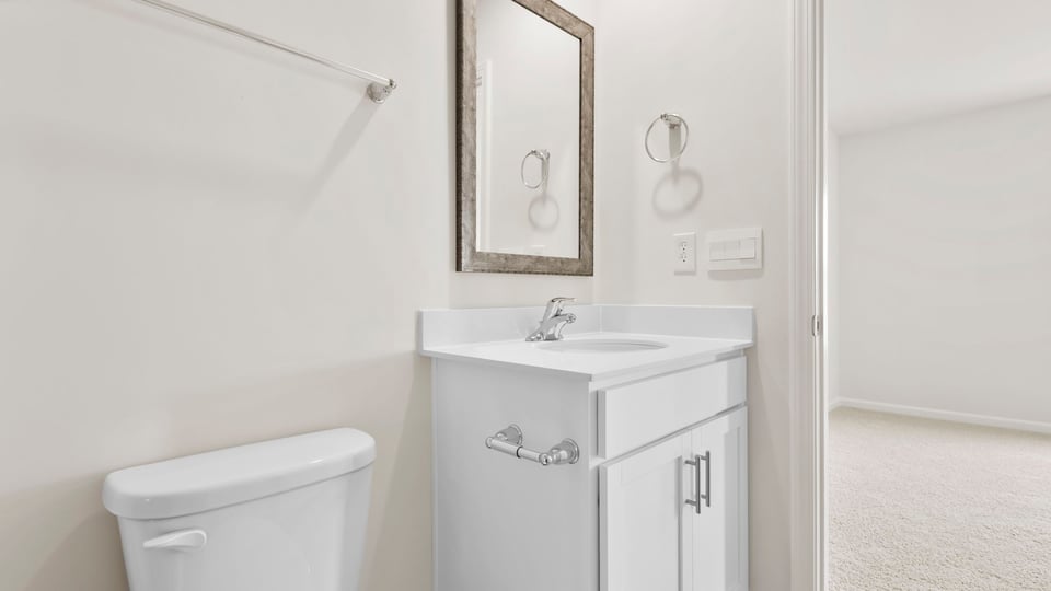 Bathroom with vanity sink.