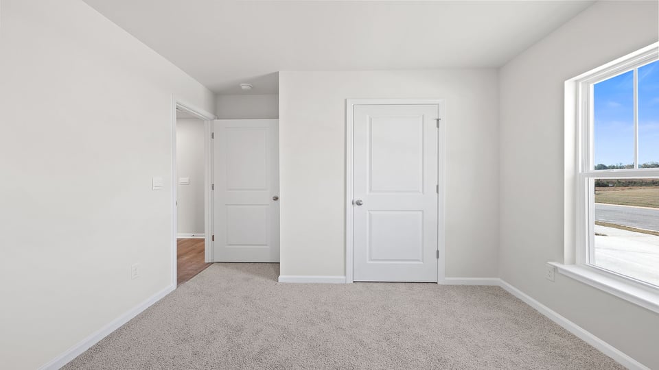 View toward the entrance and location of laundry room.