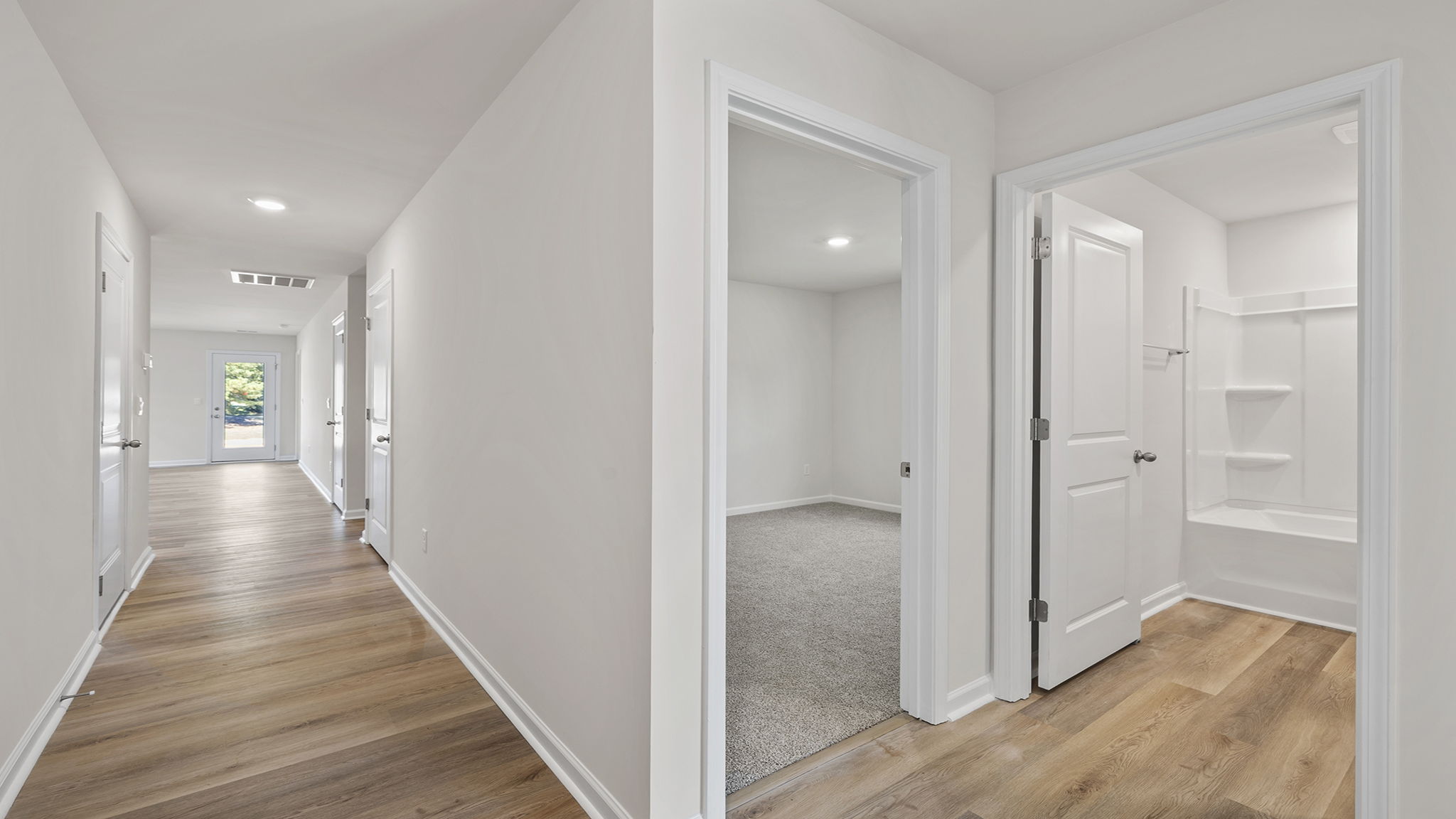 View of the hallway looking toward the living area.