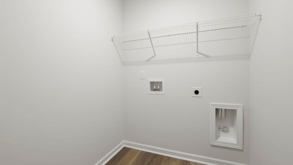 Laundry room with sink.