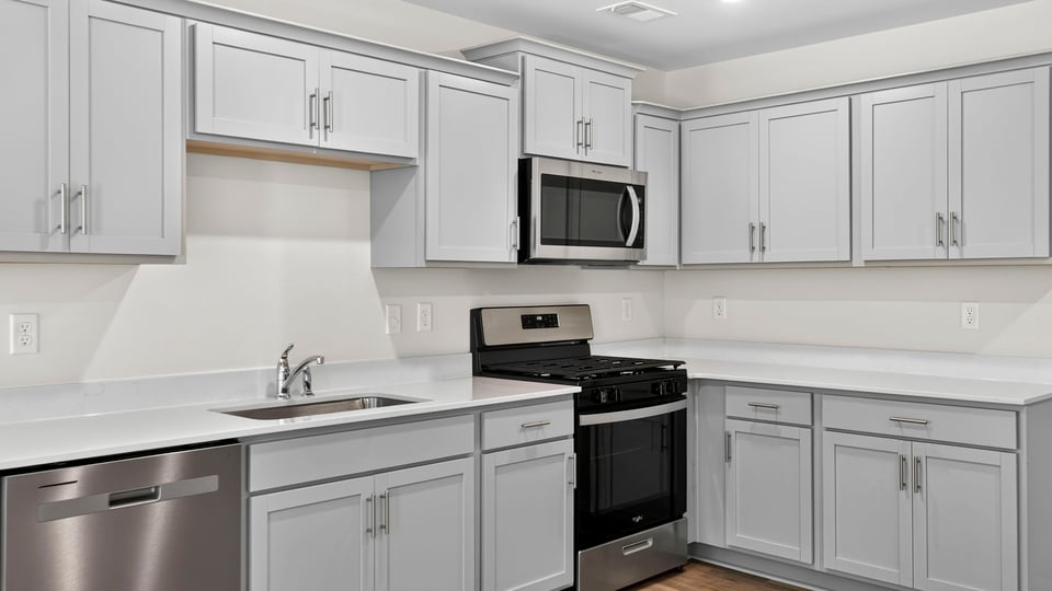 Kitchen with cabinets.