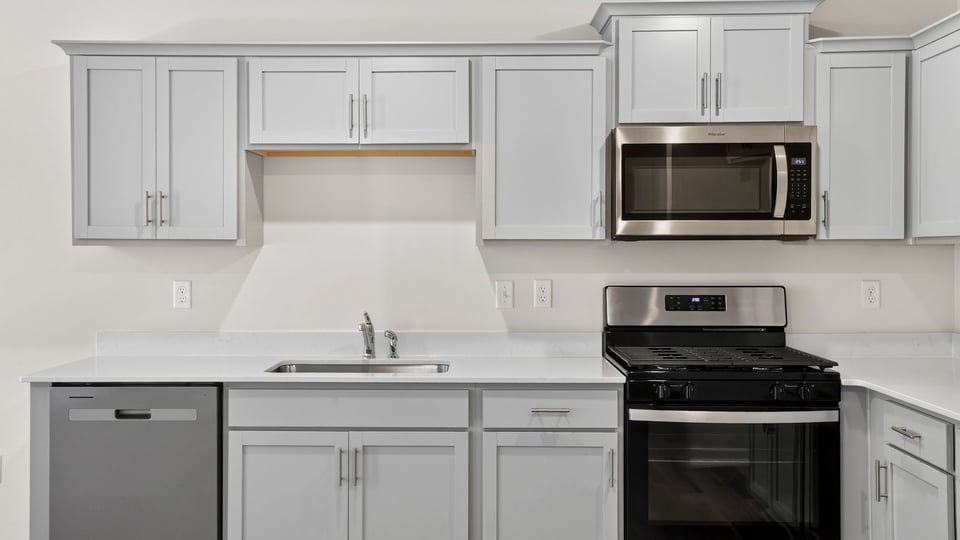 Kitchen with cabinets.