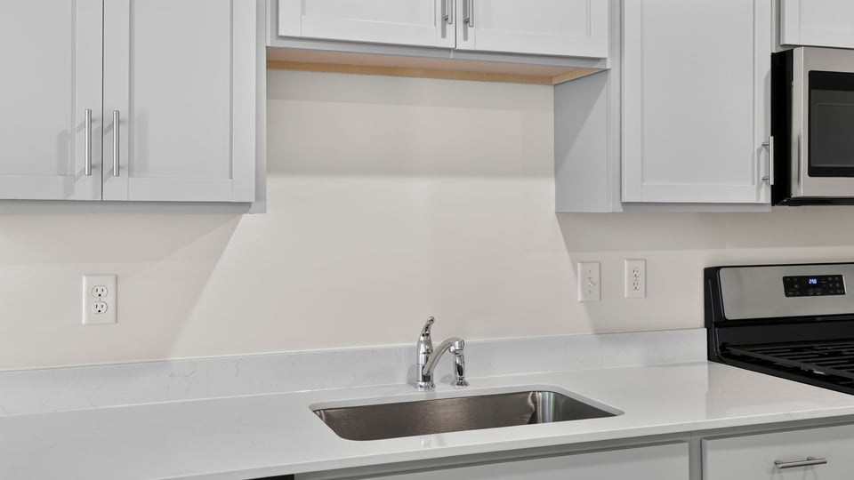 Kitchen with cabinets.