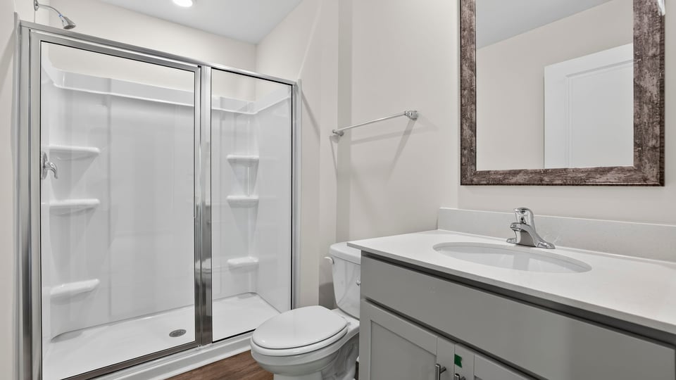 Primary bathroom with vanity sinks.