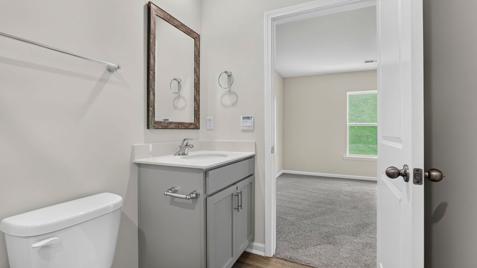 Primary bathroom with vanity sinks.