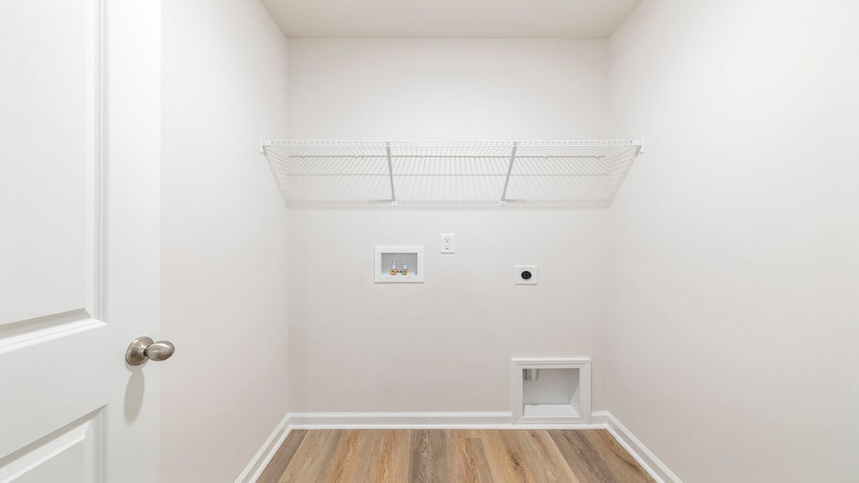 Walk-in laundry room.