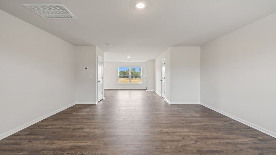 View of combination living and dining area.