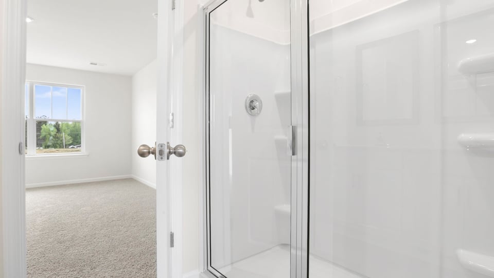Primary bathroom with double vanity sinks.