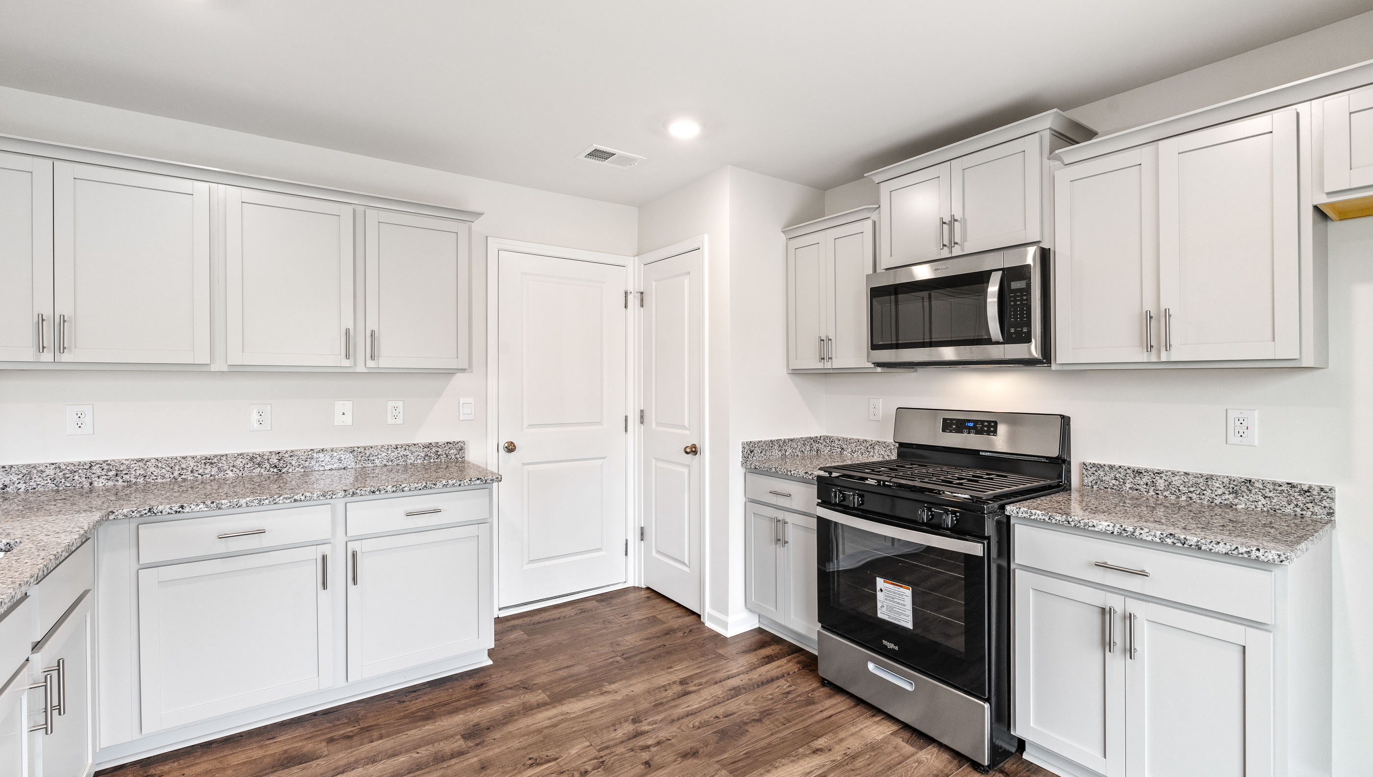 Kitchen with cabinets and appliances