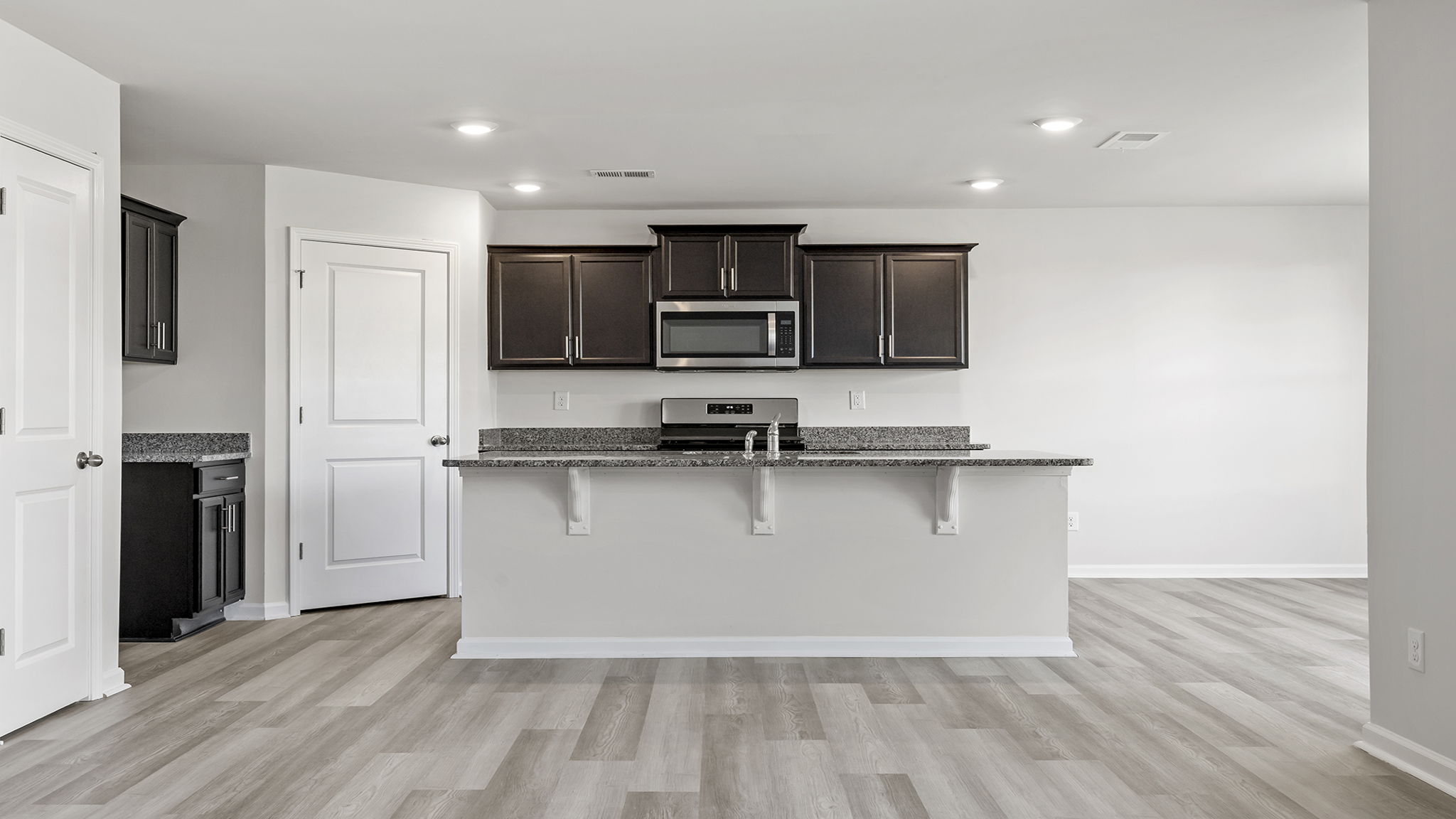 Kitchen island with granite countertops.