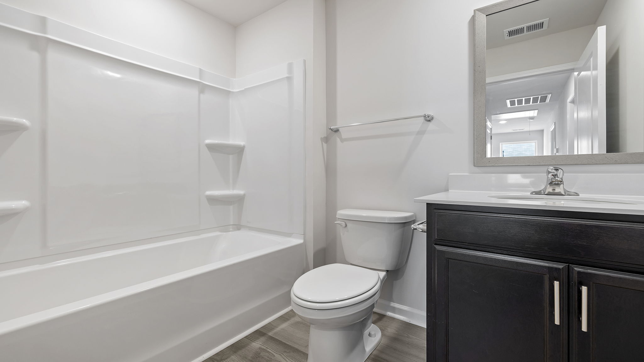 Hall bathroom with shower / tub.