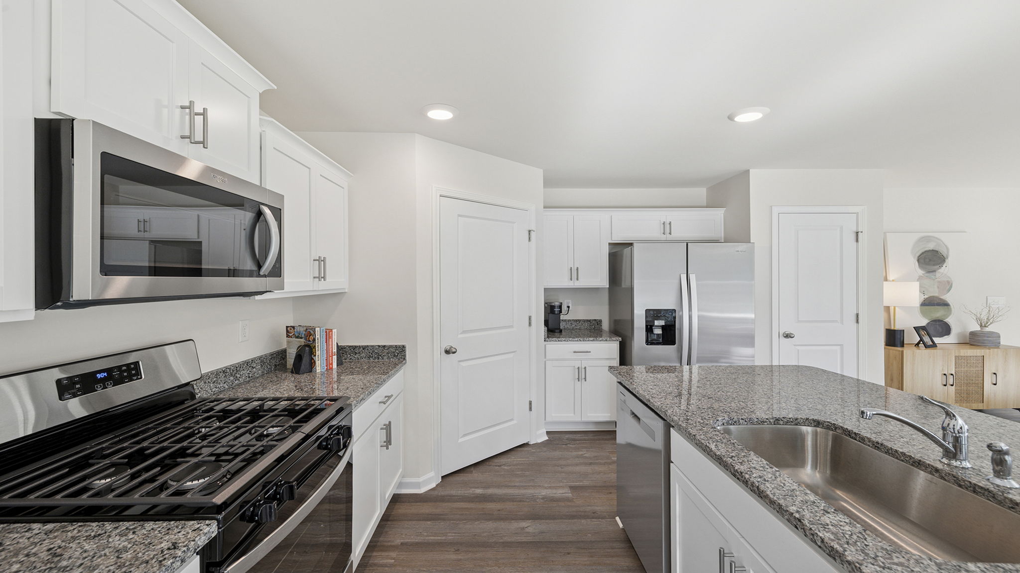 Kitchen with island and cabinets,