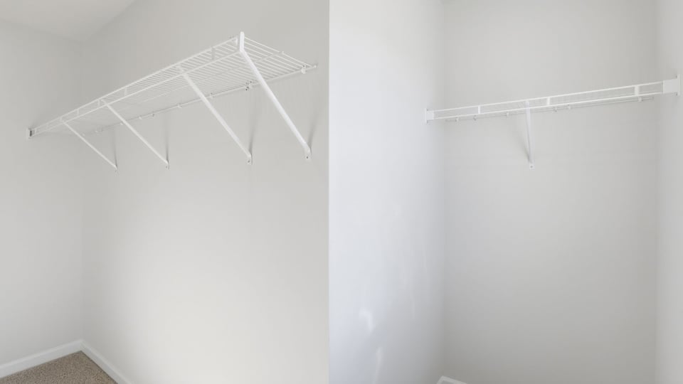 Primary closet with carpet.