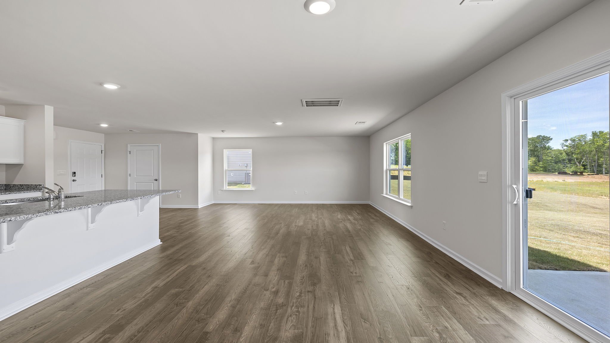 Kitchen with island and cabinets.