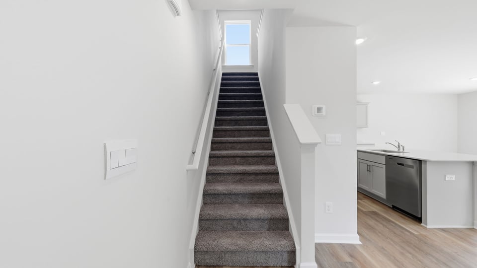 Stairs to bedrooms.