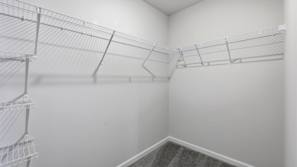 Clsoet with hanging storage racks.